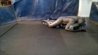 crocodile zentai struggles against masked dummy wrestler