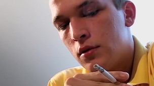 Young smoker Adam fills hand with cum after masturbating