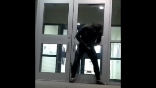 lubed rubber man cums in front of doors