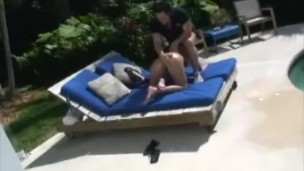 Busty brunette sucks outdoors cock by the pool