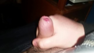 Chubby guy wanking and cumming on camera. Close up.