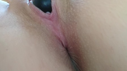 Wet pussy fucked by dildo
