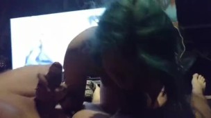 Alternative blue haired girl giving double blowjob