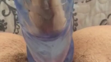 Shoving dildo into tight pussy very wet climax