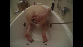 Twink takes Large Anal Insertions, Fisting, Extreme Enema Shower play