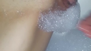 SEXY TEEN PISSES AND PLAYS WITH PUSSY IN THE BATH
