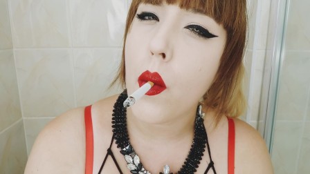 CIGARETTE DANGLING AND SMOKING CLOSE UP WITH RED LIPS