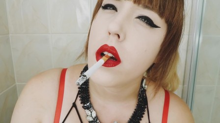 CIGARETTE DANGLING AND SMOKING CLOSE UP WITH RED LIPS