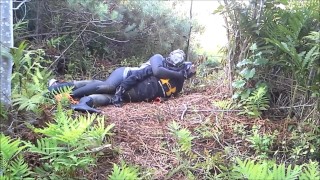 outdoors frogman in cleats attacks dummy
