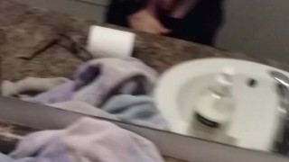 guy masterbates in bathroom