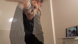 Hot tattooed guy jerking his young cock off in the shower to MILF porn