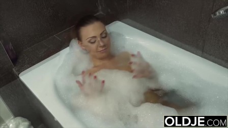 Grandpa makes his girlfriend horny in the shower and they fuck hard