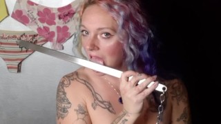 Naked swallowing a 19 inch sword