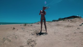 Awesome nudist girl have fun on a public beach in Valencia. Naked Outdoors