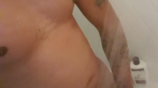 In the shower stroking my cock 