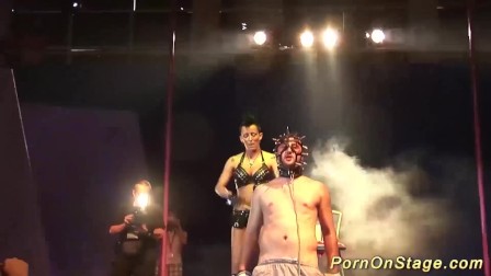 tattoed babe in a public bdasm sex show