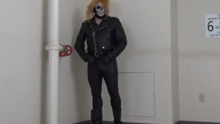 masked leather man quickly shoots his load in hotel stairway