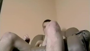 Good looking amateur twink strokes his big dick and cums