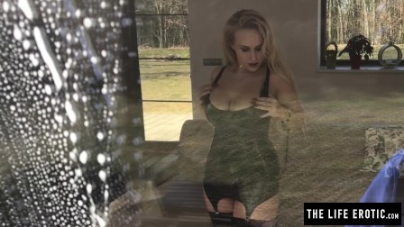 Girl with huge pierced boobs masturbates in front of a window cleaner.