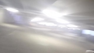 Nude in a parking garage