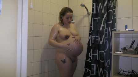 pregnant showering and boob cumshot