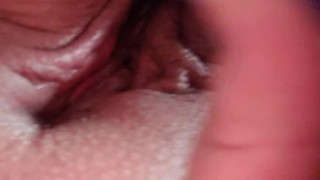 Masturbating
