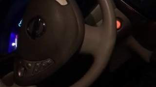 Stroking soft white cock in electric car POV