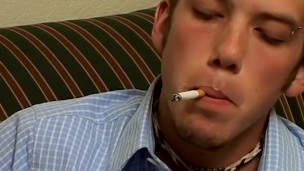 Cute young man smoking and jerking off until a wet finish