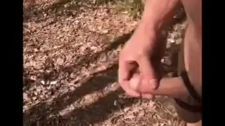 Strip naked in woods walk around and wank till cum