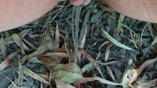 Girl Pees Outdoors In Front of a View