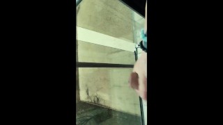 Twink with big dick cums on a balcony