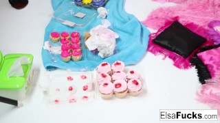 Elsa and Daisy play with some cupcakes and each other