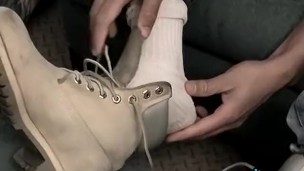 Beautiful young man plays with his perfect feet and big cock