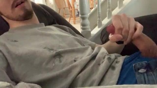 Twink covers his clothes in cum