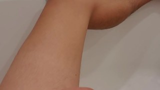 Twink jacks off in tub cumshot