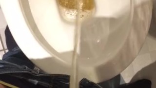Young twink pissing