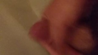 Beating off and washing my cock in the shower