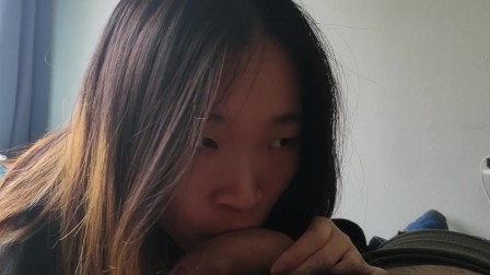 Cute asian babe sucks her BF's white cock and takes a facial POV