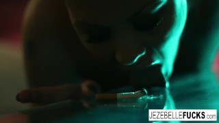 MILF Jezebelle toys her pussy in a hotel room