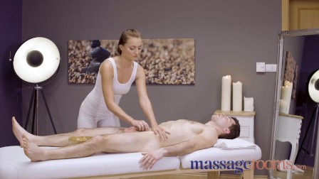Massage Rooms Sexy pert young masseuse Katy Rose gives oily hand job