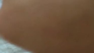 Masturbating