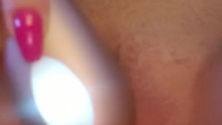 Babe plays with clit vibrator