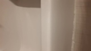 Naughty Milf Pisses in the Mens Bathroom