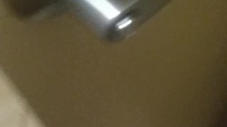 male pissing with large cockring