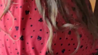 being Mrs Kitty and playing with my boobs.