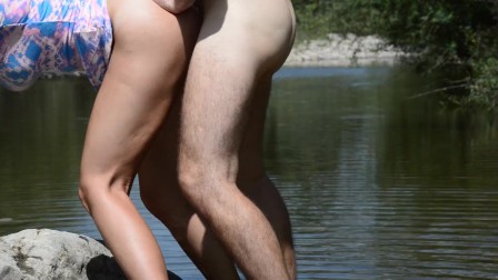 Sexy MILF being fucked outdoors by the river with cumshot on ass