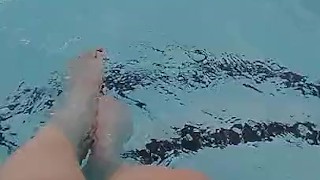 Kitty's splashes in pool