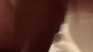 Oral cumshot in the shower