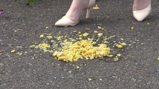 Crush-fetish. Thick legs in heels crushed the corn mercilessly.