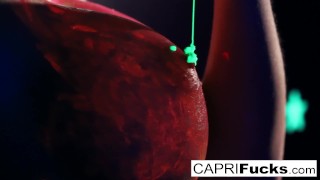 Black-light painted hottie gets a good fucking